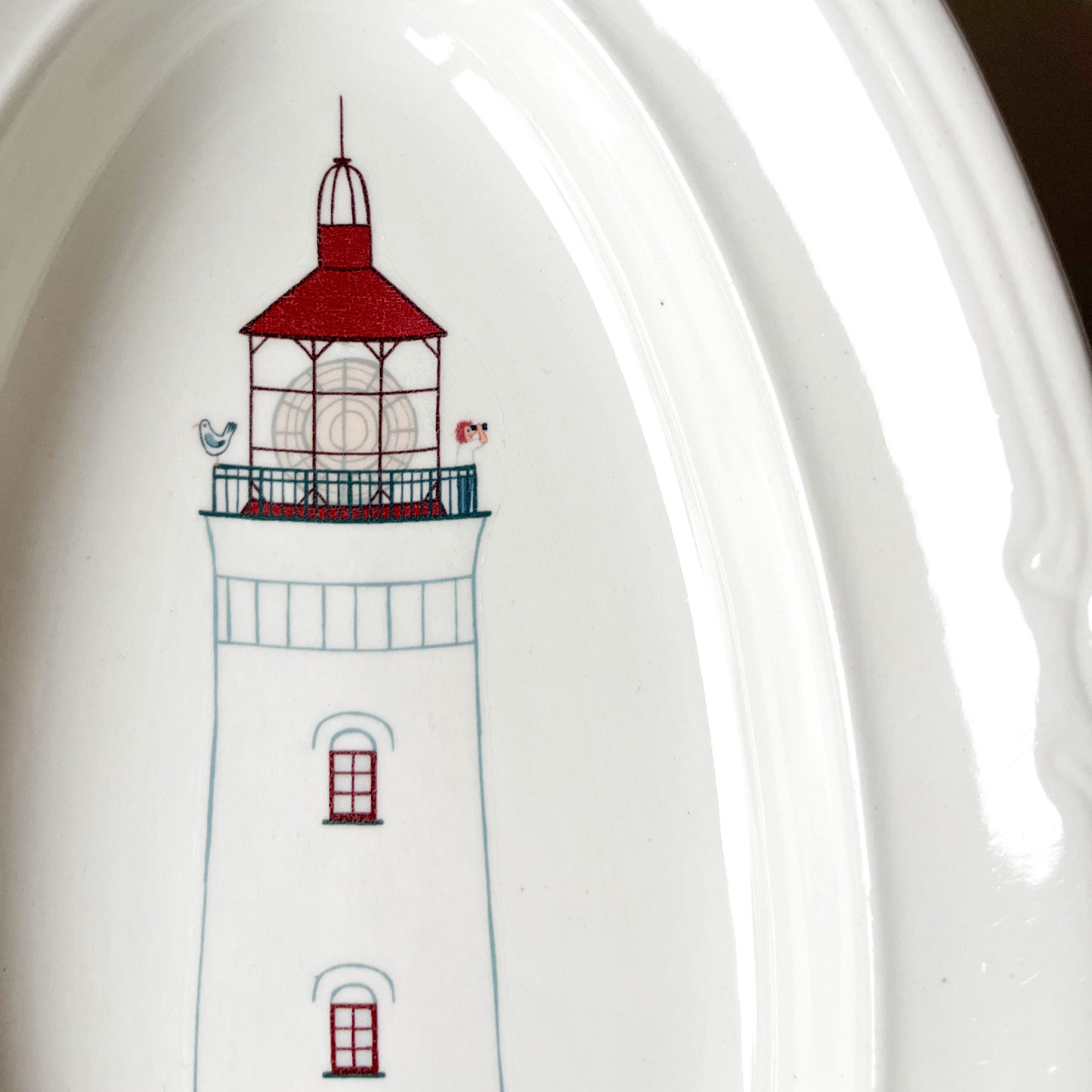 Wandbordje met witte vuurtoren