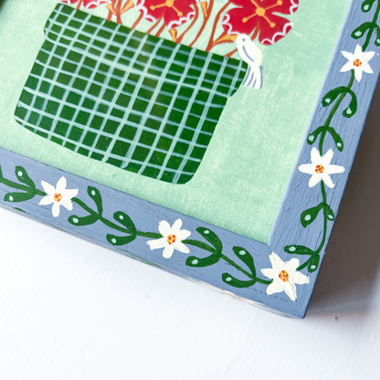 Handbeschilderde lijst met schilderij met bloemen en vogels